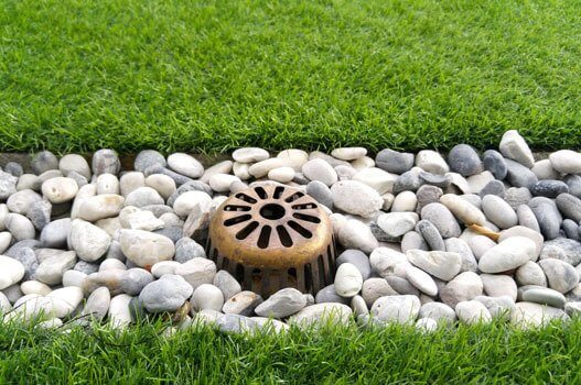 a drain embedded in stones