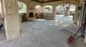custom designed outdoor kitchen and fireplace