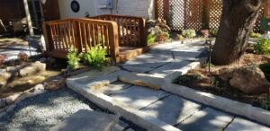 stone pavers and wooden bridge