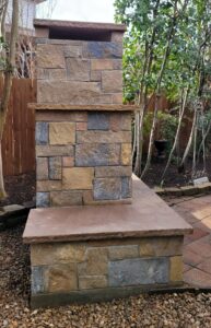 custom built fireplace made of stone