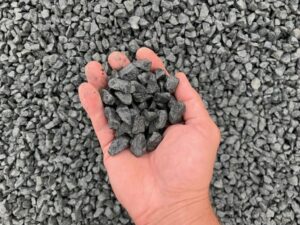 hand holding small rocks