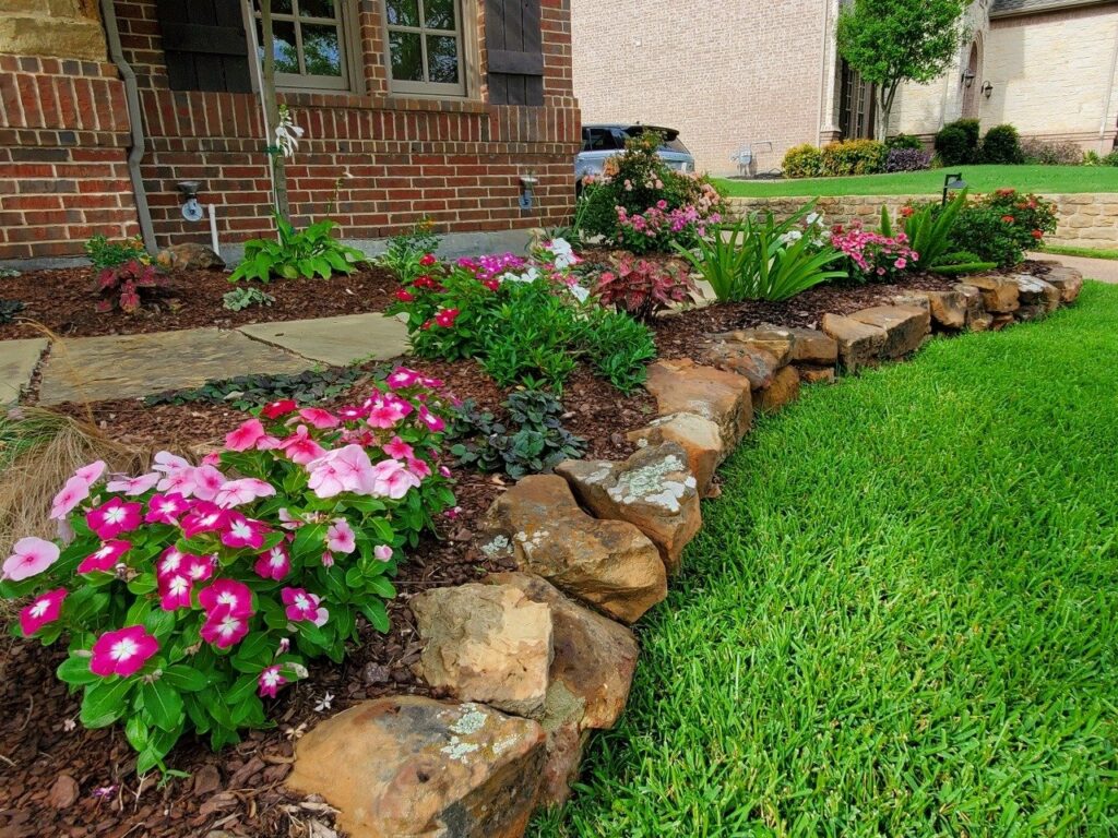 garden bed lined with rocks