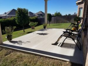 freshly done concrete pad for patio